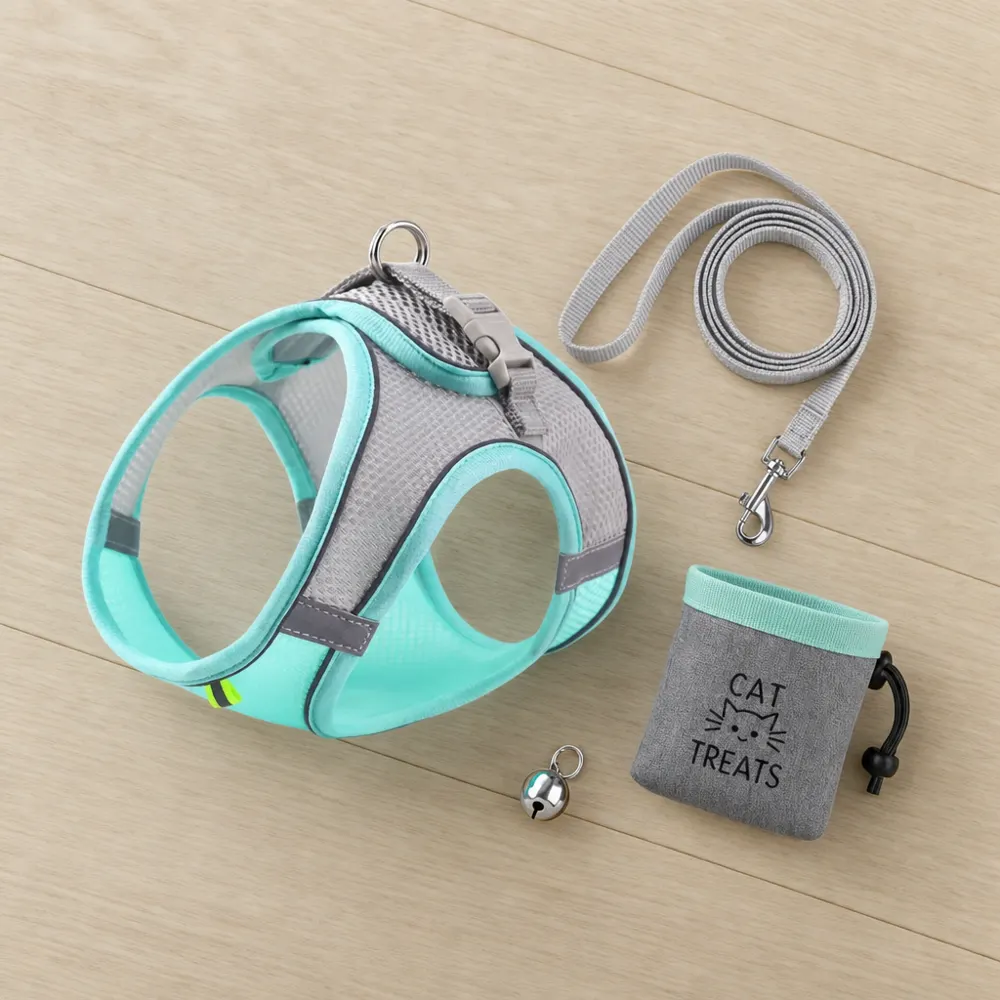 Escapaw cat harness and matching leash laid out flat, showing the vest shape and double closure