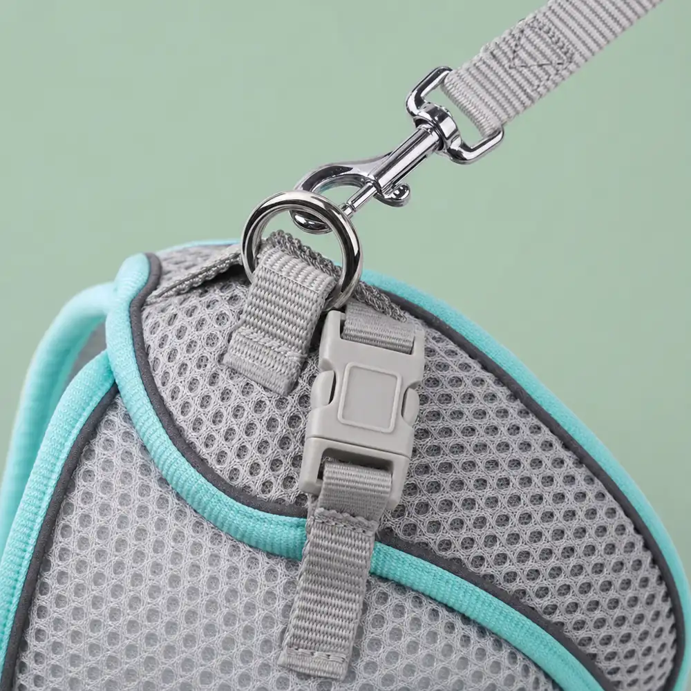 Close-up of the Escapaw clip buckle and reinforced metal D-ring