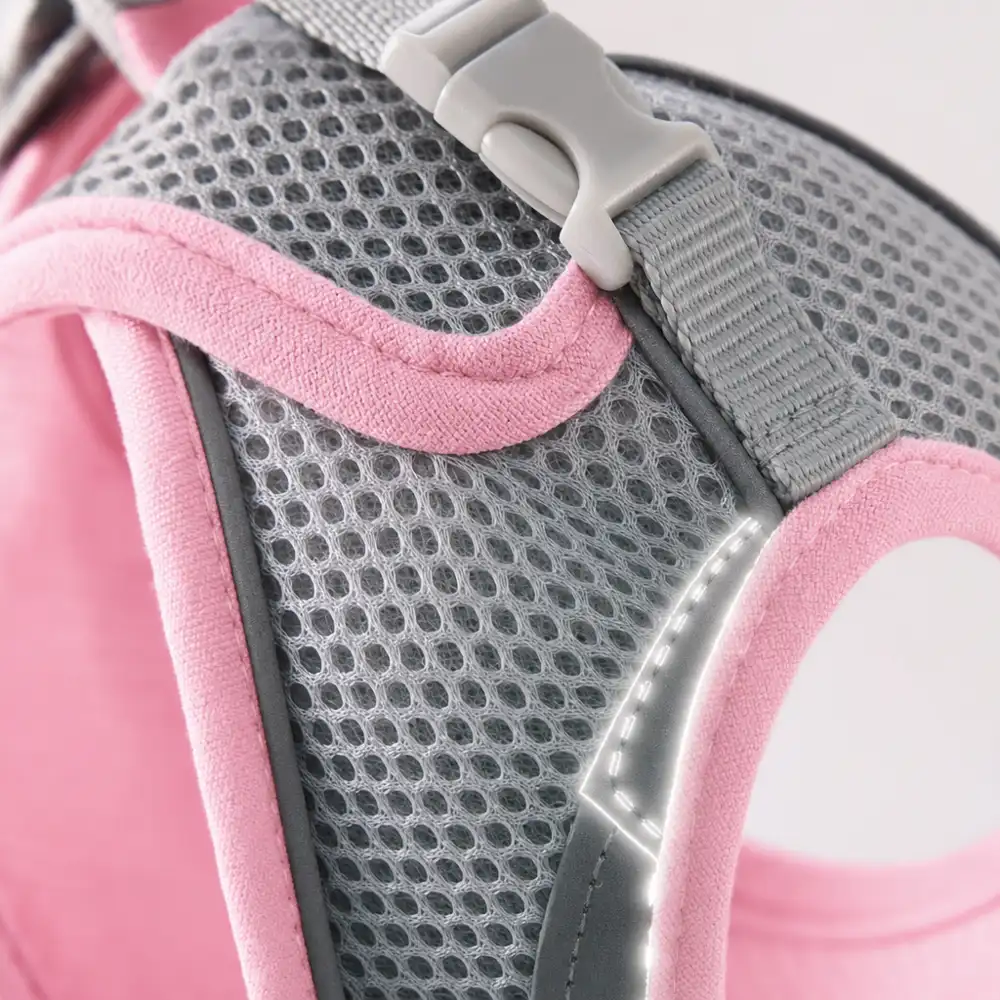 Close-up of the breathable mesh and reflective strips on the Escapaw cat harness